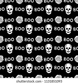 Seamless pattern with white skulls, words boo and roses on the black background. Vector illustration