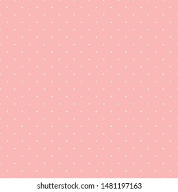 Seamless pattern with white small polka dots pastel pink background.
