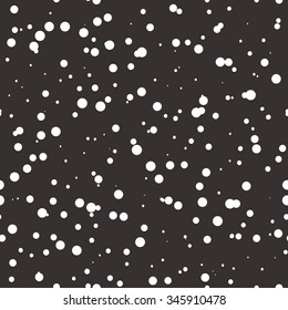 Seamless pattern with white snow on a black background, simple winter background for your design