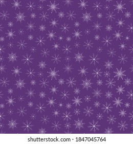 
Seamless pattern with white snowflakes. 