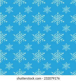 Seamless pattern with white snowflakes. 