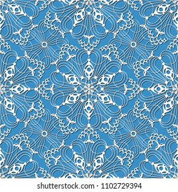 seamless pattern with white snowflakes on a blue background