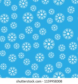 Seamless pattern. White snowflakes on a blue backgrounds. For packaging paper