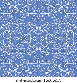 seamless pattern with white snowflakes on a blue background