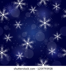 seamless pattern with white snowflakes on a blue background