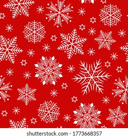Seamless pattern. White snowflakes on a red background. New Year. Vector.