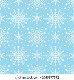 Seamless pattern with white snowflakes on blue background. Festive winter traditional decoration for New Year, Christmas, holidays and design. Ornament of simple line repeat snow flake