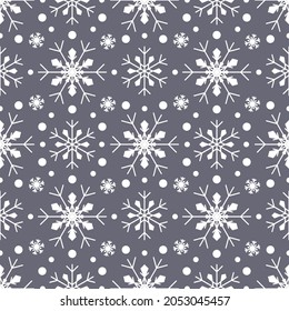 Seamless pattern with white snowflakes on grey background. Festive winter traditional decoration for New Year, Christmas, holidays and design. Ornament of simple line repeat snow flake