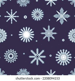 Seamless pattern with white snowflakes on a dark background. Winter seamless pattern for wrapping paper, textile and other design.