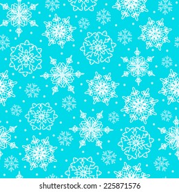 Seamless pattern with white snowflakes on background