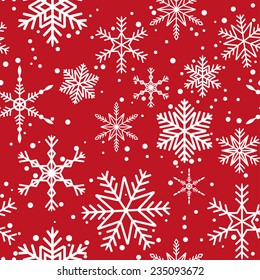 Seamless pattern with white snowflakes on red background