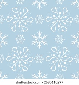 Seamless pattern with white snowflakes on a blue background