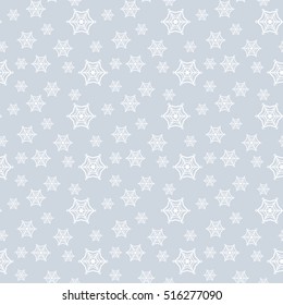 Seamless pattern with white snowflakes and stars on a blue background. Vector illustration