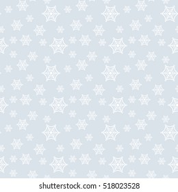Seamless pattern with white snowflakes and stars on a blue background. Vector illustration