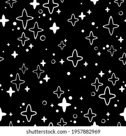 Seamless pattern of white stars on a black background