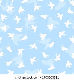 Seamless pattern with white swallow silhouette on blue background. Cute bird in flight. Vector illustration.  Doodle style. Design for invitation, poster, card, fabric, textile.