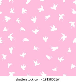 Seamless pattern with white swallow silhouette on pink background. Cute bird in flight. Vector illustration.  Doodle style. Design for invitation, poster, card, fabric, textile.