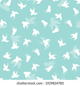Seamless pattern with white swallow silhouette on blue background. Cute bird in flight. Vector illustration.  Doodle style. Design for invitation, poster, card, fabric, textile.