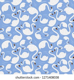Seamless pattern white swan on blue background.