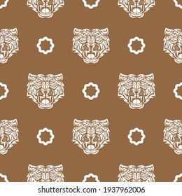 Seamless pattern with white tiger face in boho style. Polynesian style tiger face. Good for backgrounds, prints, apparel and textiles. Vector 