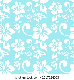 Seamless pattern with white tropical flowers on a light blue background.