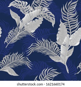 Seamless pattern with white tropical leaves on classic blue background. 