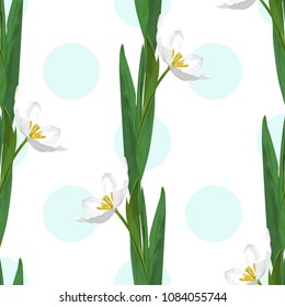Seamless pattern with white tulips on the background of blue big polka dots