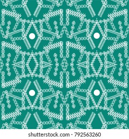 Seamless pattern with white winter motifs on a dark emerald background. Vector Illustration