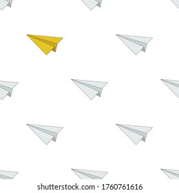 A seamless pattern with white and yellow paper planes.