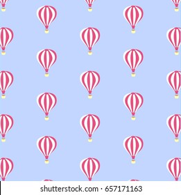 Seamless pattern with white-red hot-air balloons on a purple background. Vector illustration. 