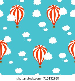 Seamless pattern with white-red hot-air balloons and cute clouds on a blue background. Vector illustration.