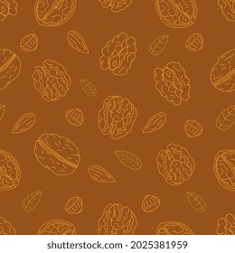 Patrón sin foco de nueces enteras y medias, almendras y avellanas con hojas sobre fondo marrón