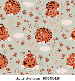 Seamless pattern with wild animals in nature. Stylized tiger in flat style.  Vector illustration for paper, cover, fabric, gift wrapping, wall art, interior decor.