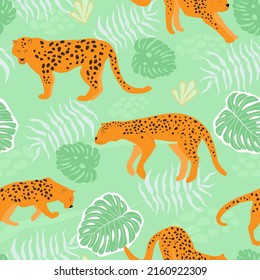 Seamless pattern with wild animals spotted leopards on the background of tropical jungle palm leaves. Vector graphics.