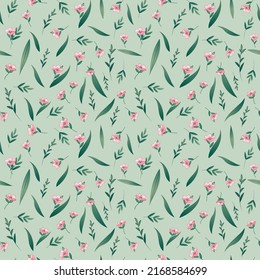 Seamless pattern of wild flowers against a green background. Texture for paper, textiles, wallpaper, etc.