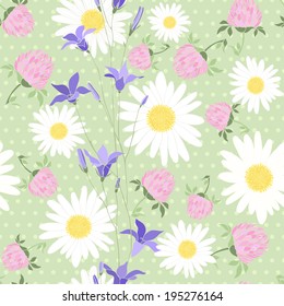 Seamless pattern with wild flowers on the background of with polka dots