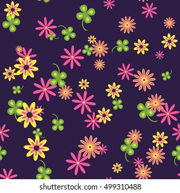 Seamless pattern of wild flowers on a blue background. Warm bright colors. Fun mood.