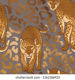 Seamless pattern with a wild gold Jaguars and drawing predatory skin. Textile composition, hand drawn style print. Vector illustration.