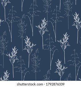 Seamless pattern with wild herbs and grasses.Thin delicate lines silhouettes of different plants. White line on blue background.