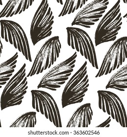 Seamless pattern with the wings. Ink illustration. Isolated on white background. Decorative ornament for wrapping paper.