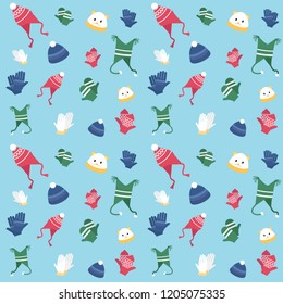 Seamless pattern of winter accessories: hat, gloves, on a blue background.