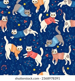 Seamless pattern with winter cats in sweaters. Vector graphics.