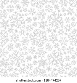 Seamless pattern with winter Christmas snowflakes. Hand-drawn for coloring book. Black and white.