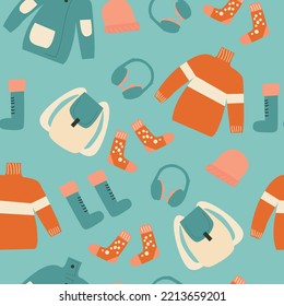 Seamless pattern with winter clothes