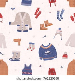 Seamless pattern with winter clothes and outerwear on light background. Backdrop with warm seasonal clothing or apparel. Cartoon vector illustration for wallpaper, wrapping paper, textile print.