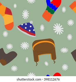 seamless pattern of winter clothing for textile printing and packaging