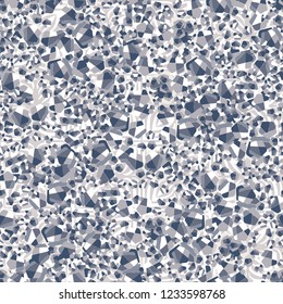 Seamless pattern. Winter colors. Broken pentagons. Background from square flowers. Camouflage style.