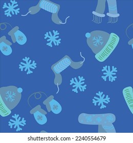 Seamless pattern with a winter hat, scarf, mittens on a tie. Vector illustration on a blue background.