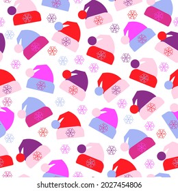 Seamless pattern of winter hats. A collection of colorful woolen cotton knitted autumn-winter hats for children and adults.