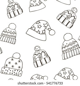 seamless pattern of winter hats in doodle style
